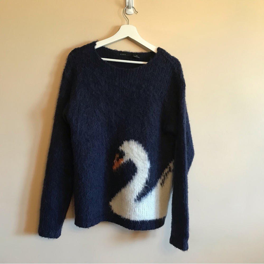 Press Wool Blend Swan Sweater in size large with navy blue background